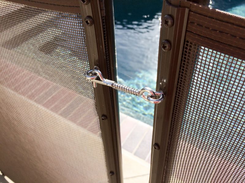 Mesh Fence Securing Pool Perimeter